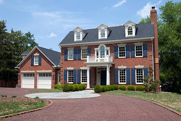 red bricked house with blue roof -colonial red brick remodel exterior