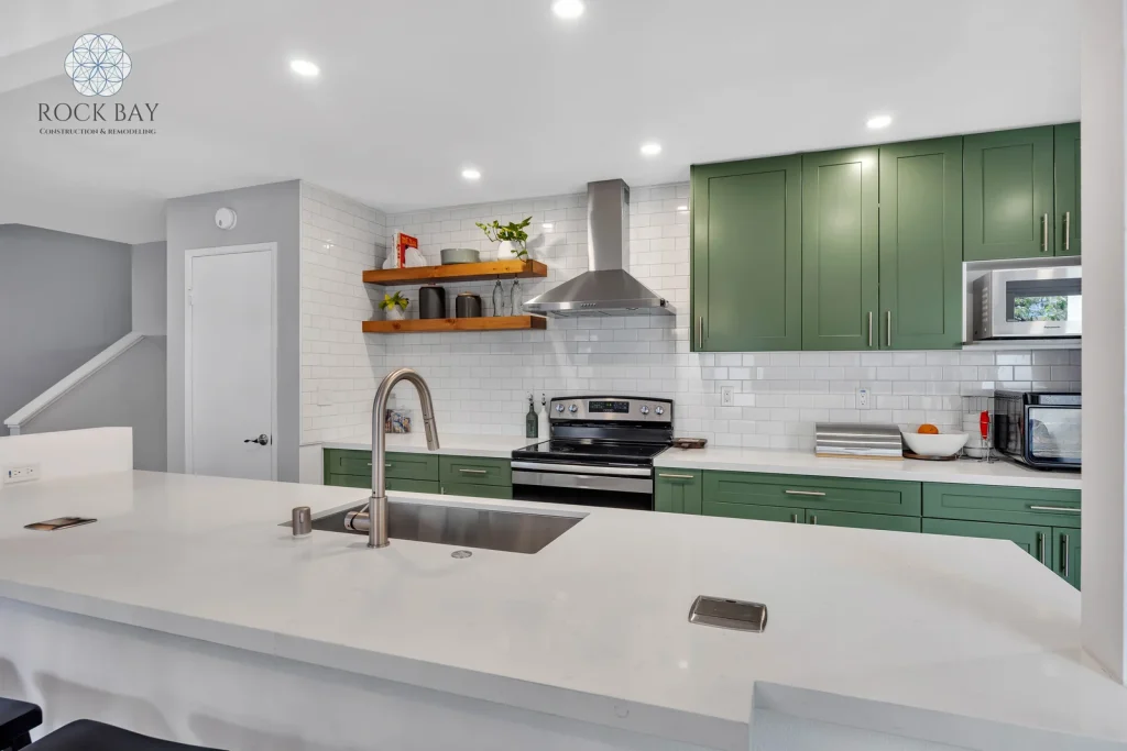 Kitchen home renovation sink green cabinets