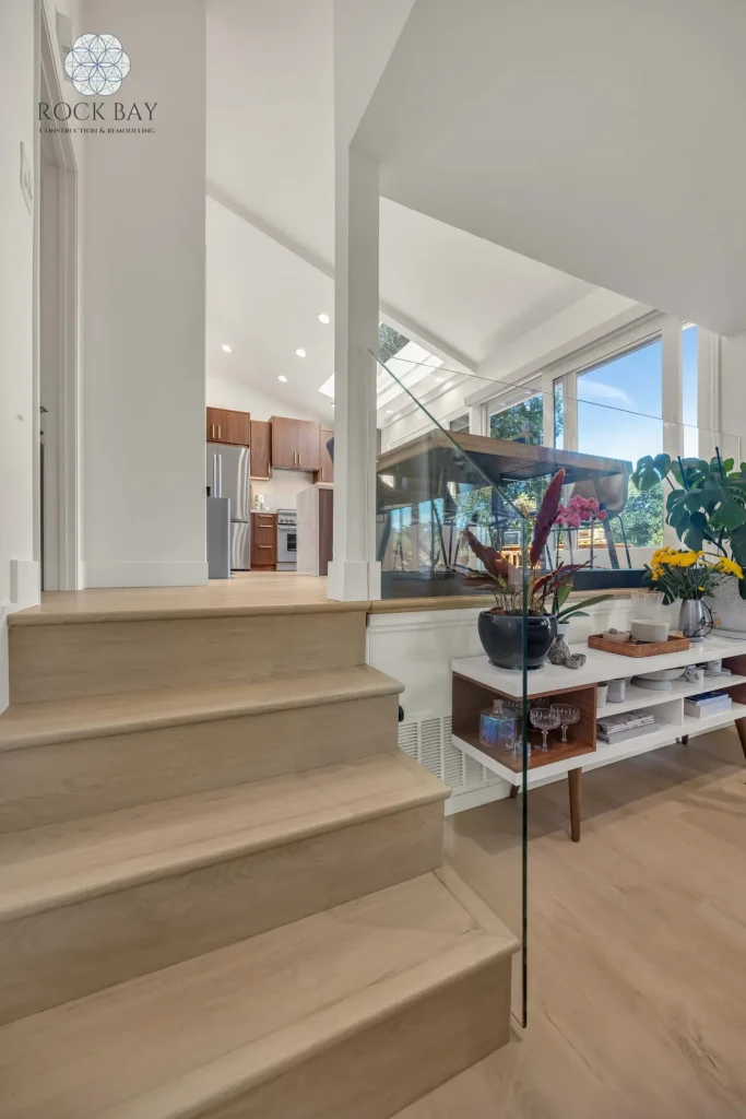 Complete home remodel floating stairs glass railing