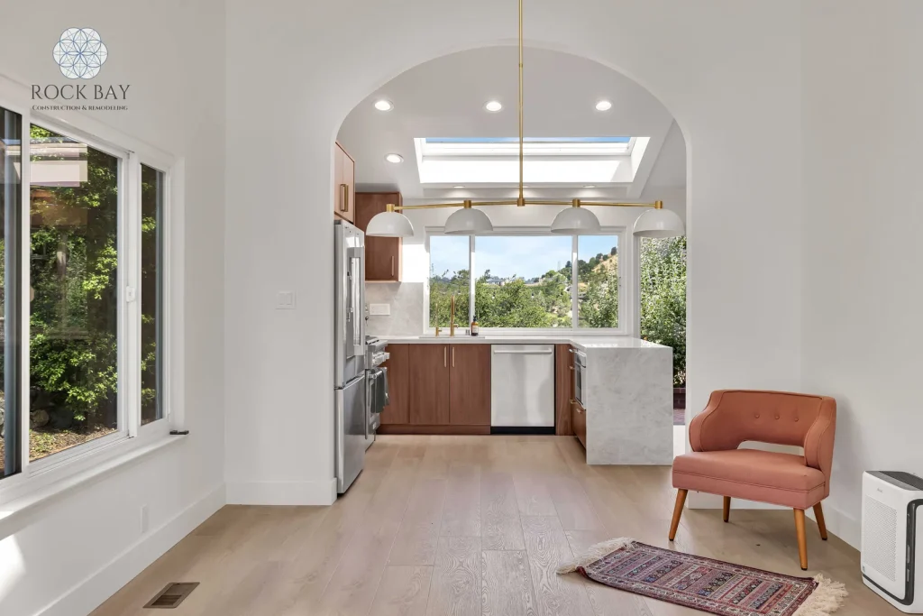 Full home remodel arched entry kitchen view