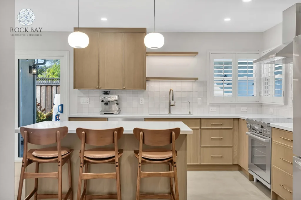 Full kitchen remodel bar seating window shutters