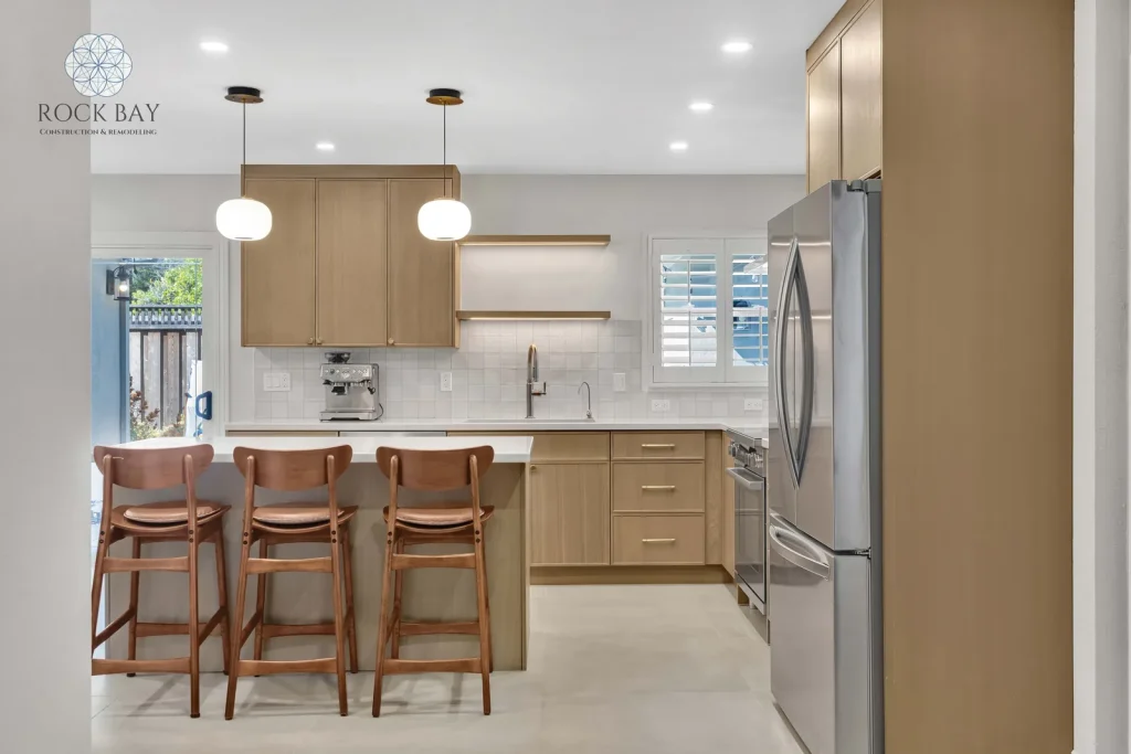 Full kitchen remodel breakfast bar white tile backsplash