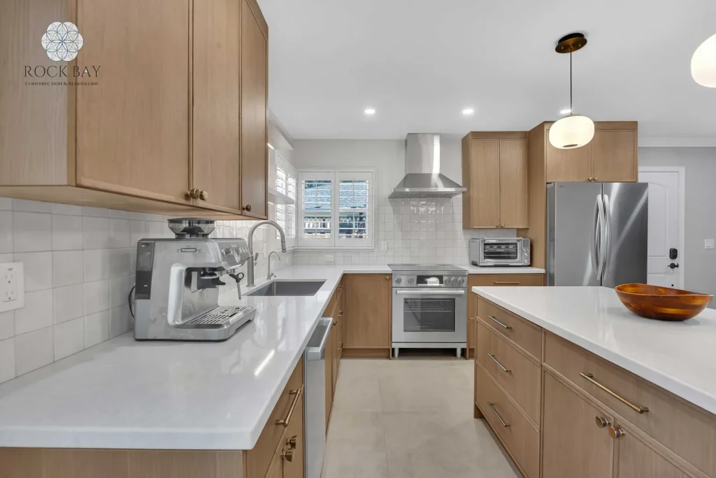 Full kitchen remodel quartz countertops light wood cabinetry
