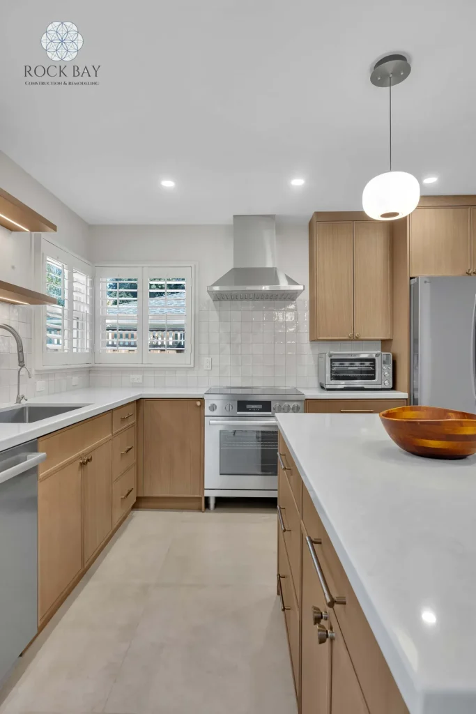 Full kitchen remodel range hood island view