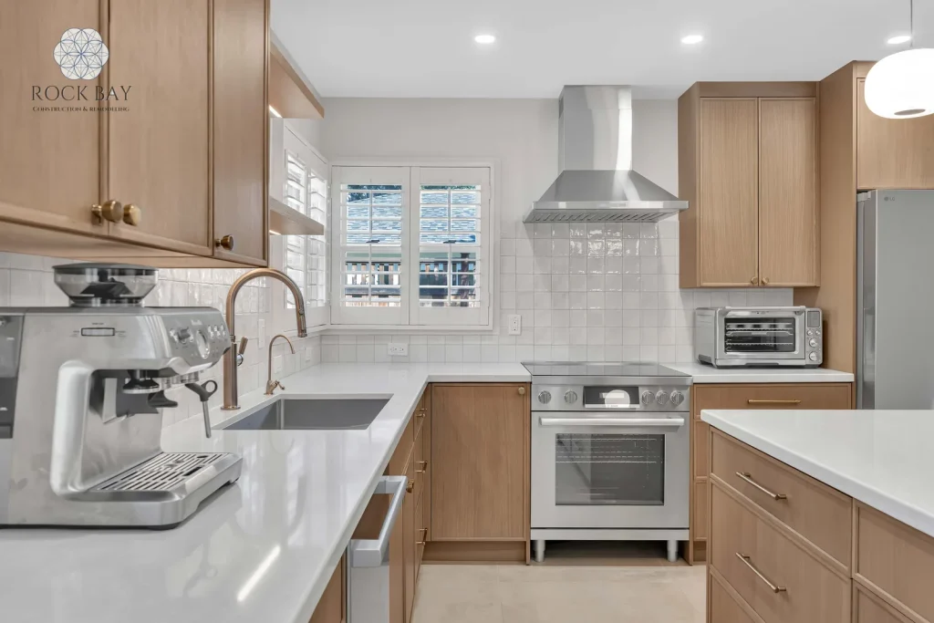 Full kitchen remodel stainless range hood countertops